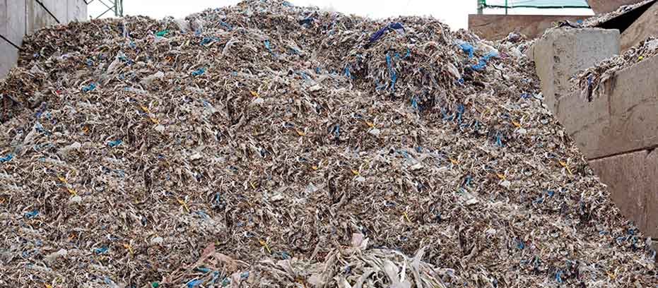 Photo du recyclage d'une pile de déchets