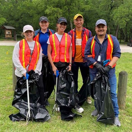 Employees Collecting Litter